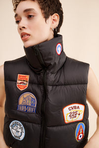 RILEY VINTAGE All Patched Up Puffer Vest ships in 2 weeks