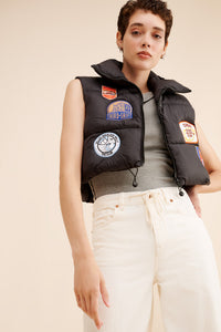 RILEY VINTAGE All Patched Up Puffer Vest ships in 2 weeks